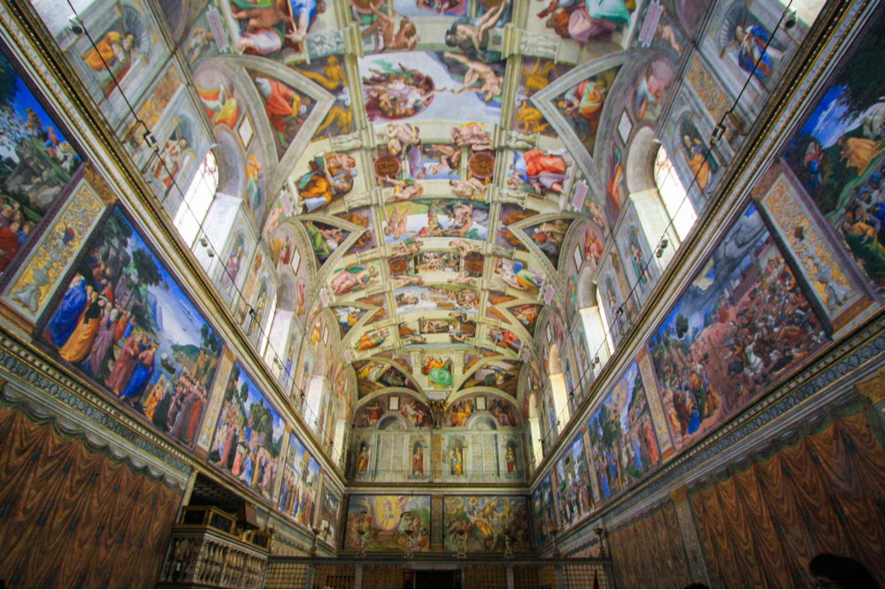 The ceiling of Sistine Chapel painted in fresco, Vatican, Rome.