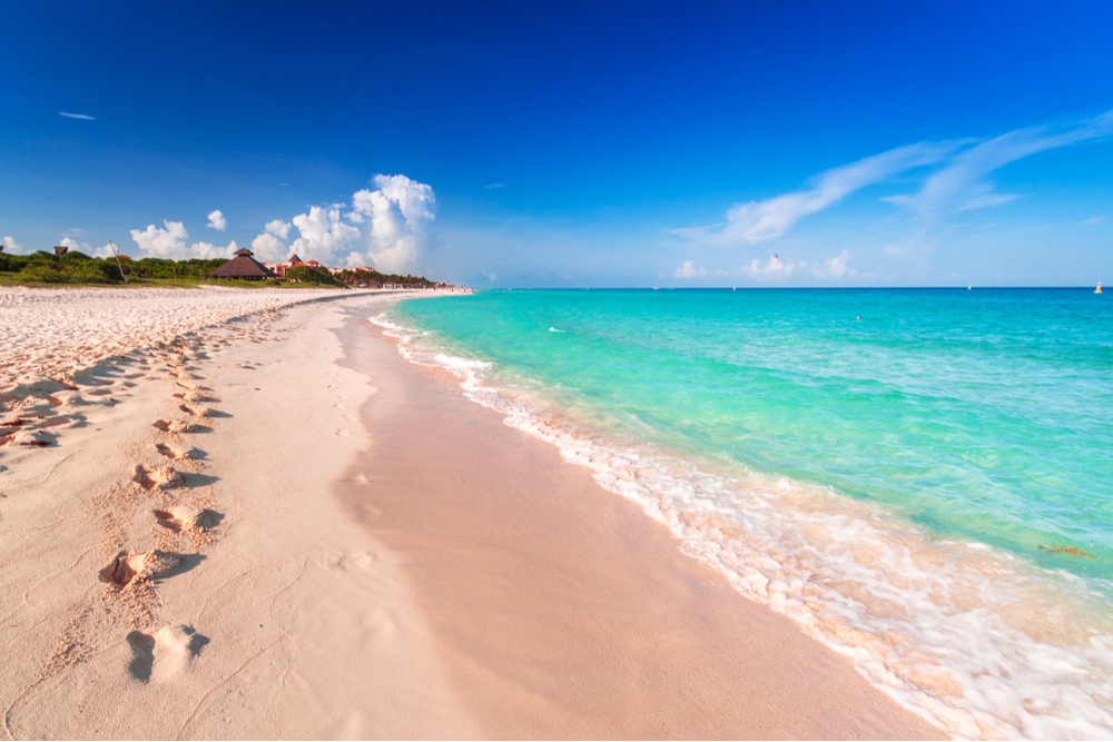 empty Beach at Caribbean sea in Playa del Carmen, Mexico with footprints