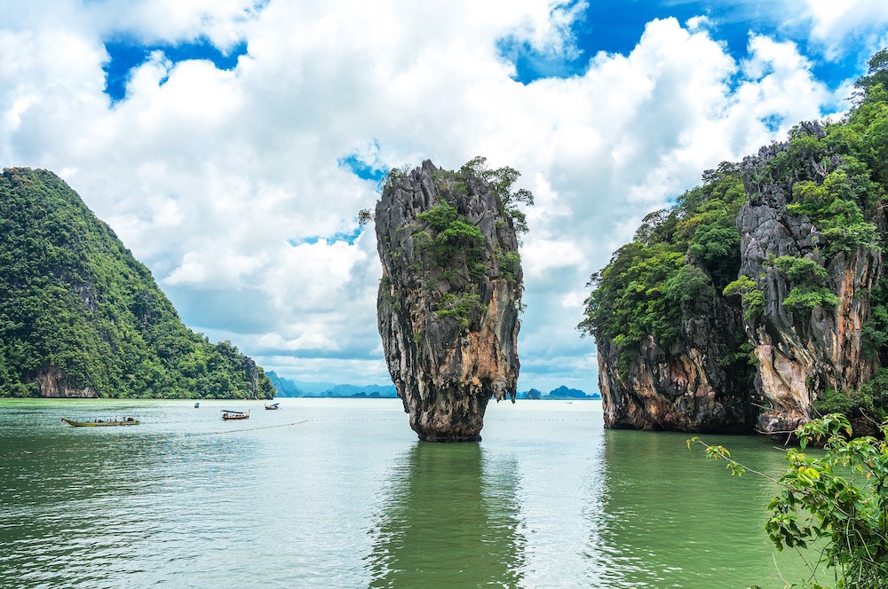 limestone rock jutting out of water in the islands of Thailand