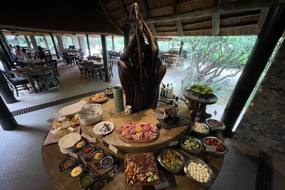 The salad buffet and open-air dining room at Sabi Sabi Bush Lodge, South Africa.  