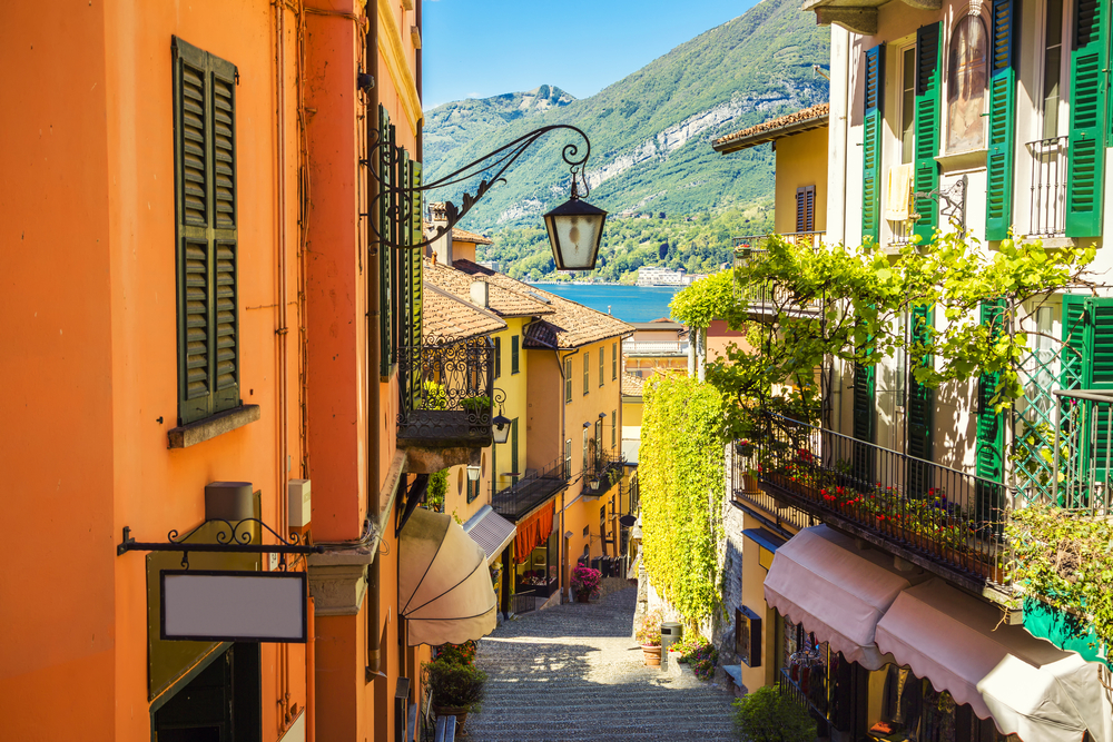 Old town street and colorful buildings in Bellagio city, Italy.