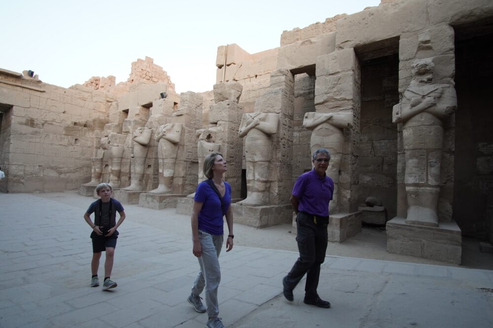 Brook with her son exploring the Karnak Temple with their guide.