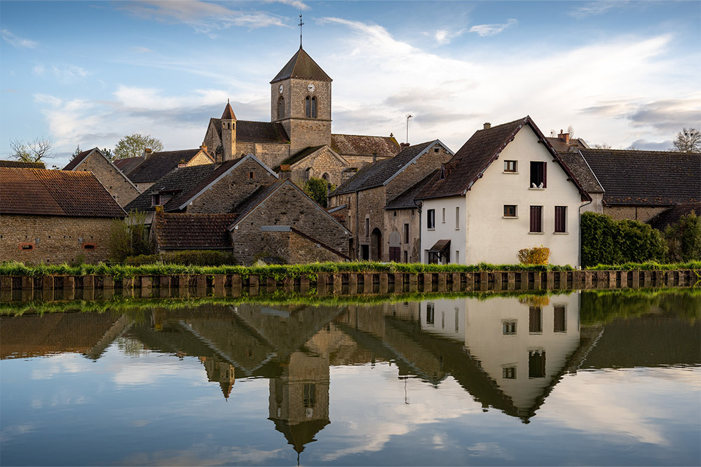 A beautiful landscape of Vandenesse en Auxois Burgundy Canal barge.