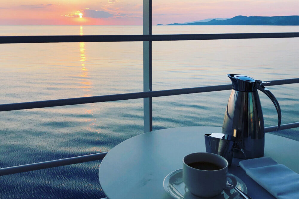 Sunrise on the balcony of a cruise.