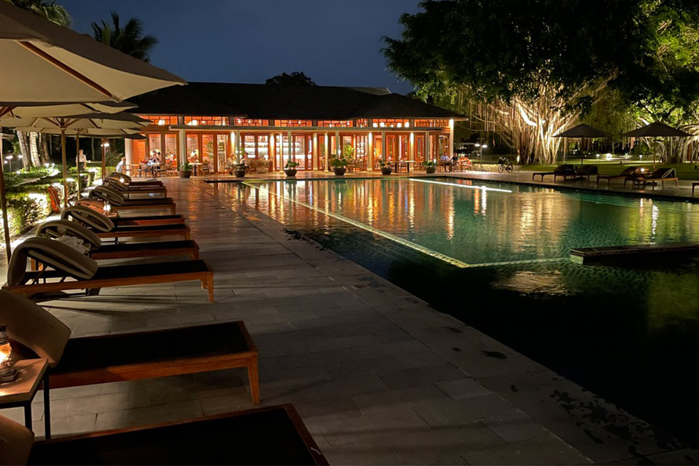 The Azerai Can Tho Restaurant Pool in Vietnam at night
