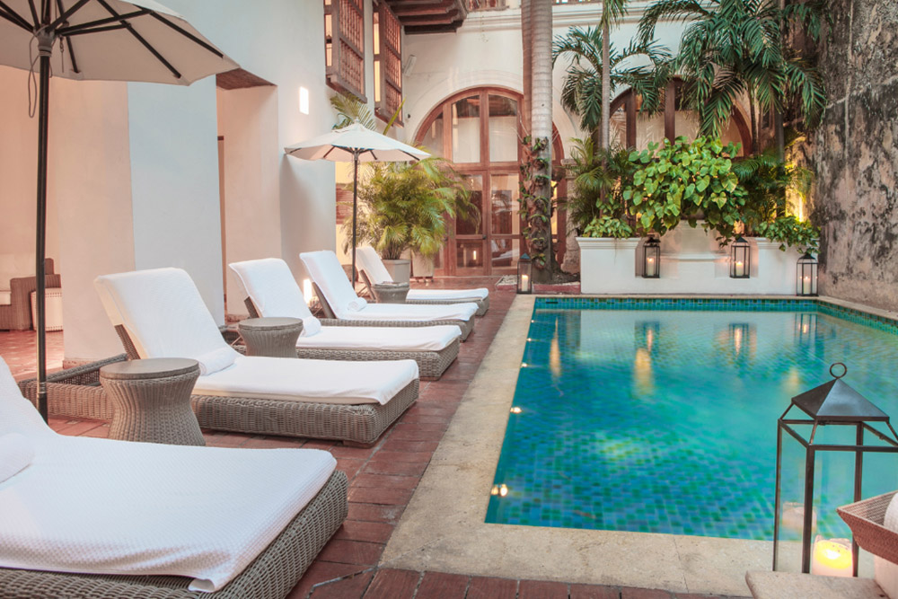 The pool in Casa San Agustín with sun-beds.