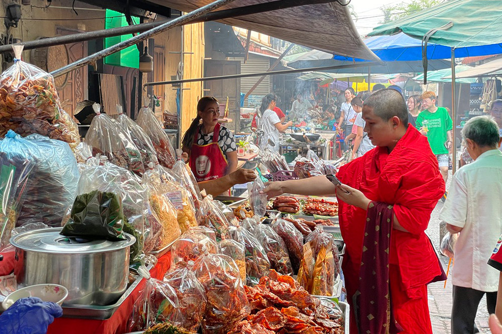 The morning market in Laos full of people.