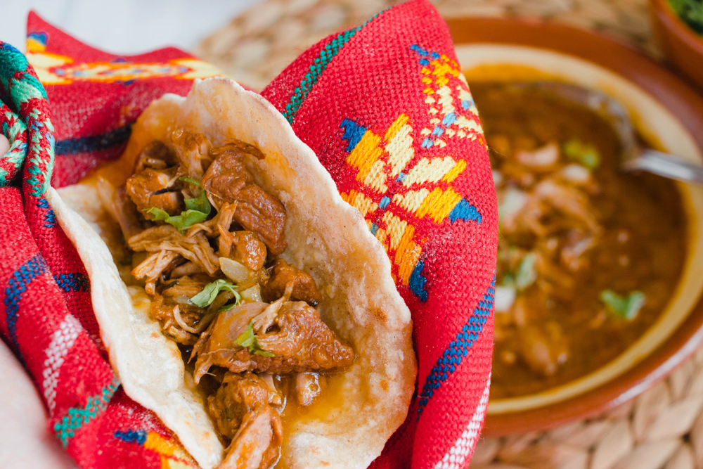 Taco de birria is a traditional dish from Jalisco, Mexico and it's spicy usually eaten with Mexican style beef stew.