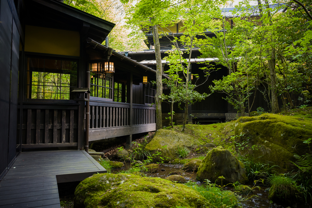 A traditional onsen ryokan hot spring inn Japanese hotel in the middle of nature.