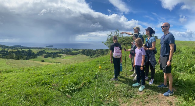 Family hike up the mountain to Lagao do Fogo on São Miguel Island in the Azores.