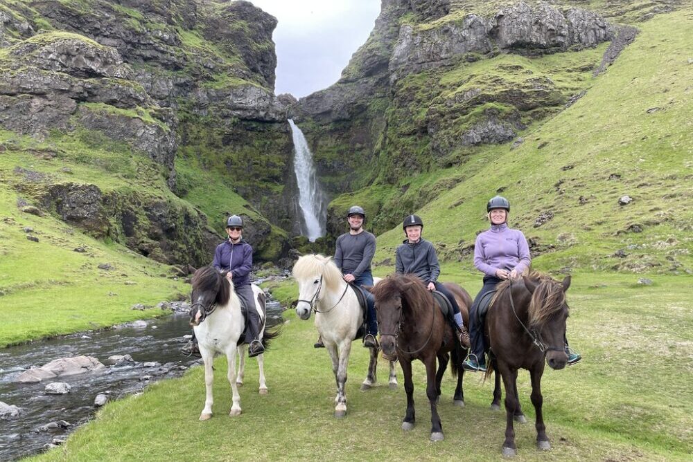 Susan Crandell and her daughter, son-in-law, and grandson riding Icelandic horses.