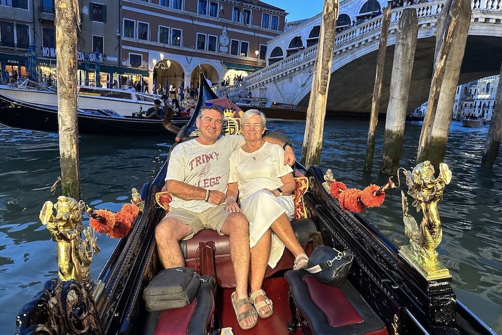 Liz Tidswell and husband enjoying a gondola ride in Venice.