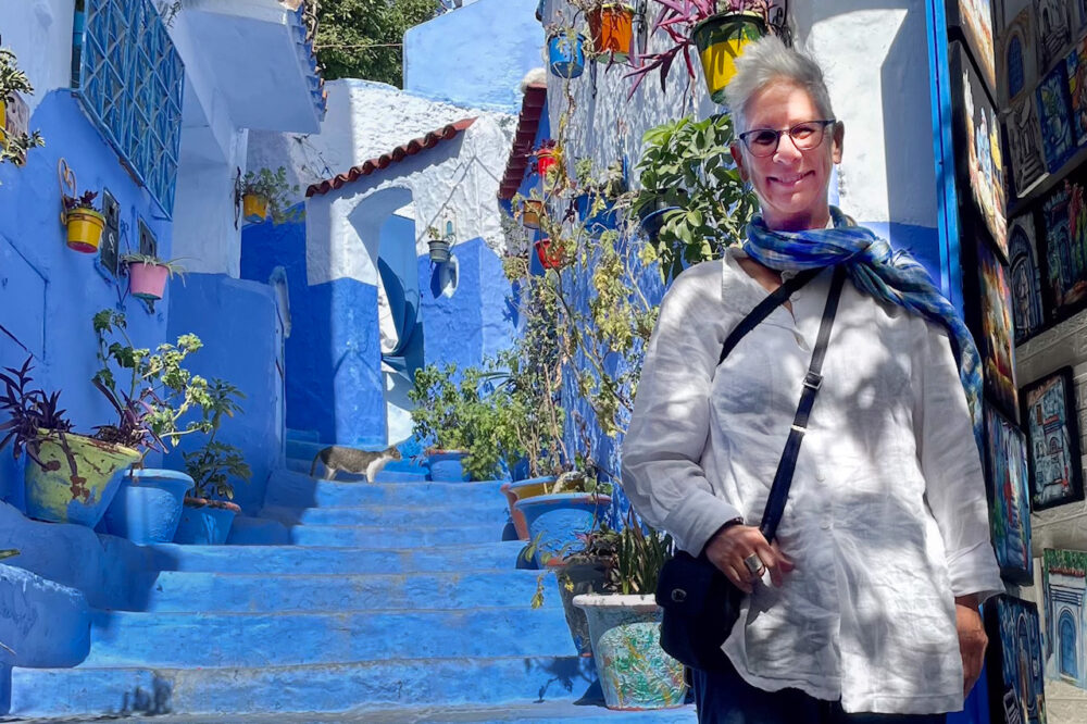 Traveler in the "Blue City" of Chefchaouen, Morocco.