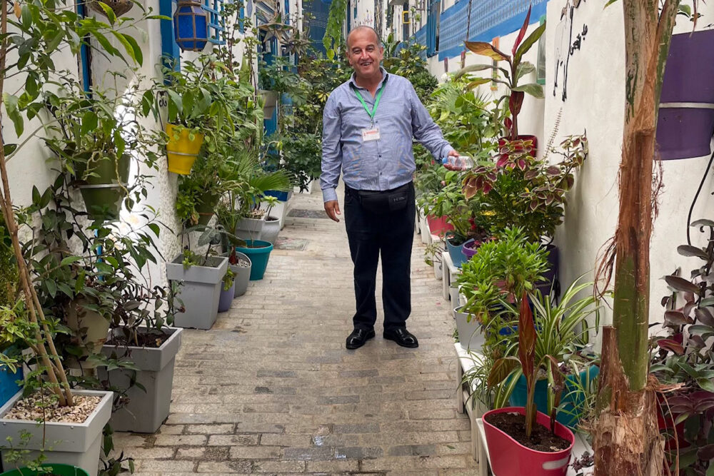 Our traveler's guide outside his family home in Tangier's Medina, Morocco.