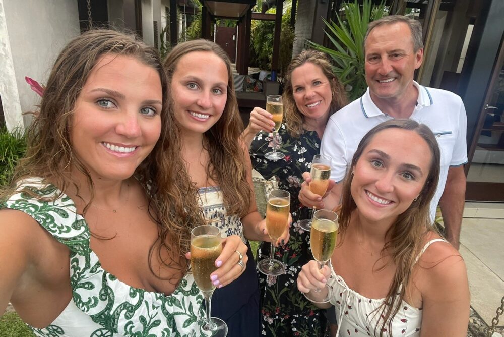 A selfie of the Schildmeyer family toasting at Niramaya Resort & Spa in the bungalow in Port Douglas.