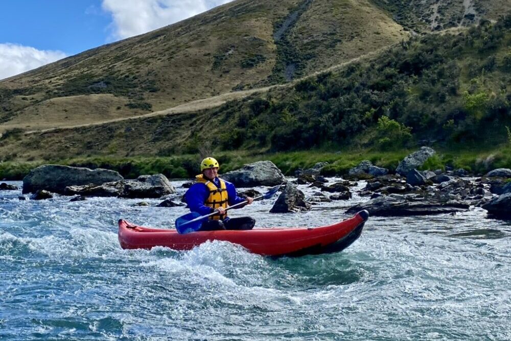Traveler kayaking on the Ahuriri River, new Zealand.