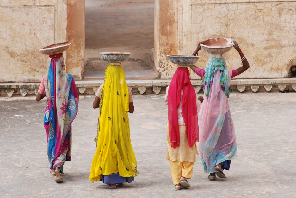 Women servants dressed in sari.