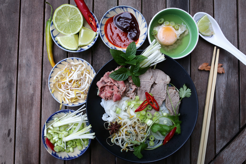 Ingredients in bowl for preparing Vietnamese rice noodles.