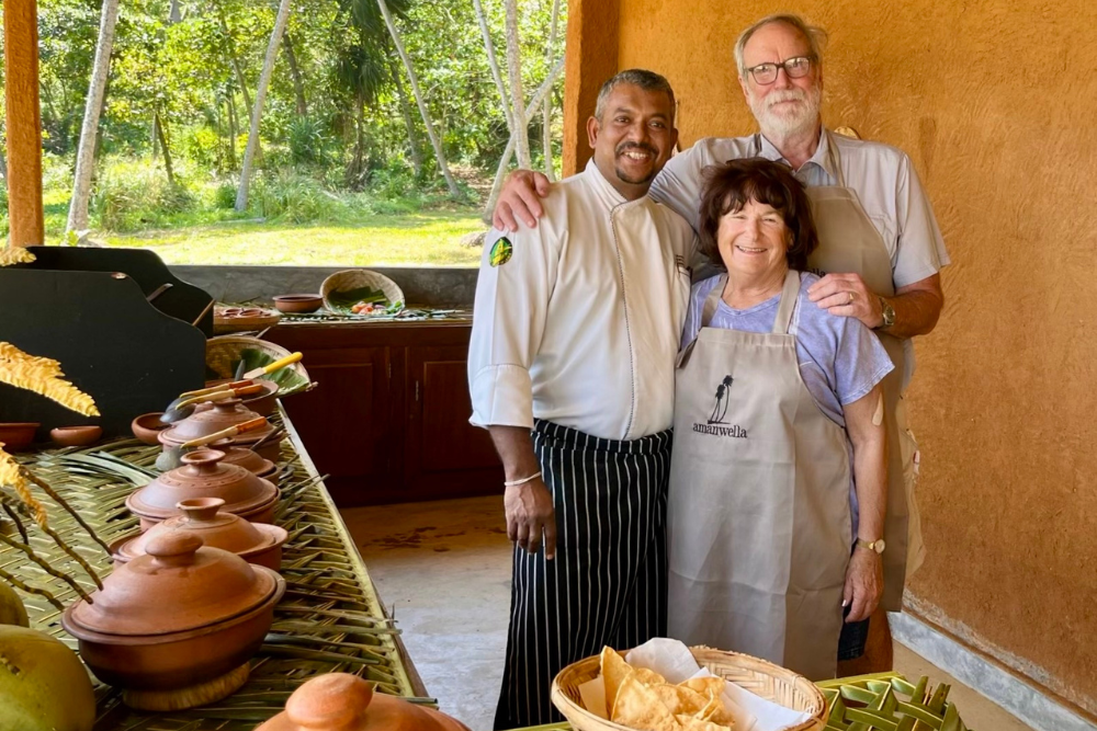 Travelers with the chef at their cooking class in Amanwella, Sri Lanka.