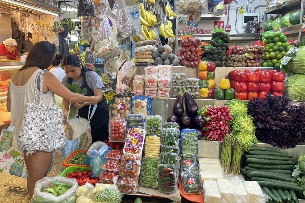 A woman shopping at the Surquillo market, in Lima.