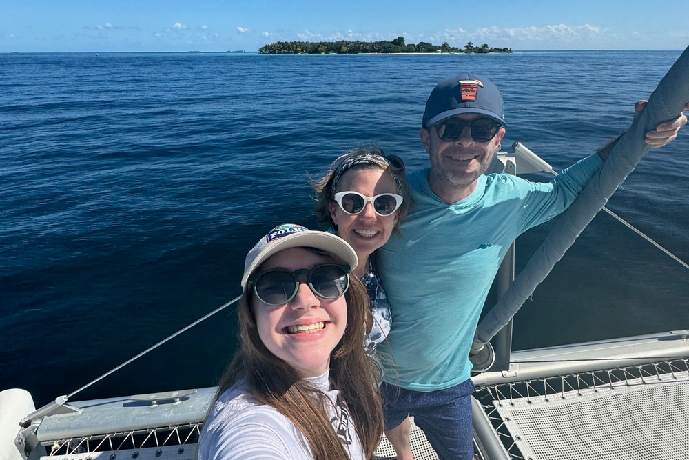 Travelers Jeremy Silverman and his family taking a selfie in Belize.