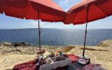 Picnic on the beach on Gozo Island, Malta.