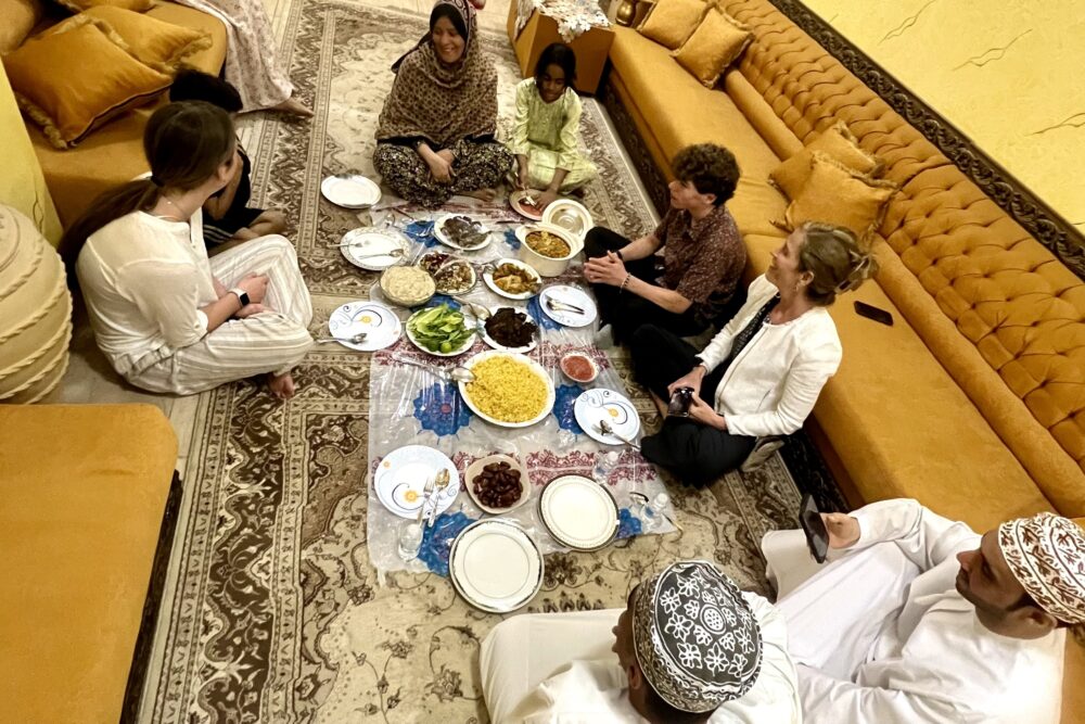Tracy Reller hosted by a local family for a meal in Oman.