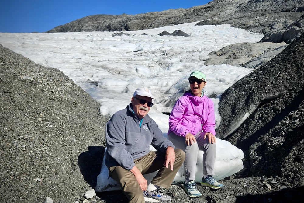 Travelers Joe Tobin and Mary Lou Voytko on a glacier in Whitcombe Valley, New Zealand.