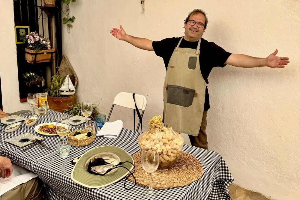 Chef Pepe in his small village restaurant in Benelauria, Spain cooked lunch accompanied by wine for traveler Laurie Richter.
