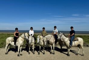 Lisa Malecha and family riding horses along the Camargue, France.