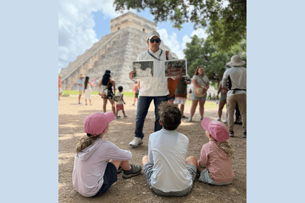 Andrea Mathis’ children learning about Mayan culture, from their guide, at Chichén Itzá.