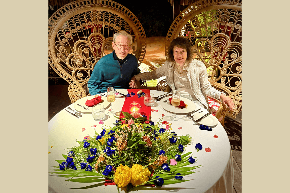 David Sabritt and Mina Miller having a private anniversary dinner on the beach at Le Taha’a in French Polynesia.