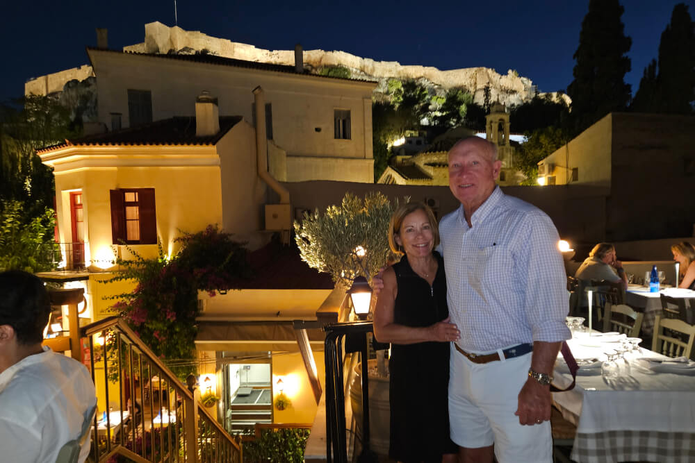 Louise and Lee Andrews at a rooftop restaurant in Athens, Greece.