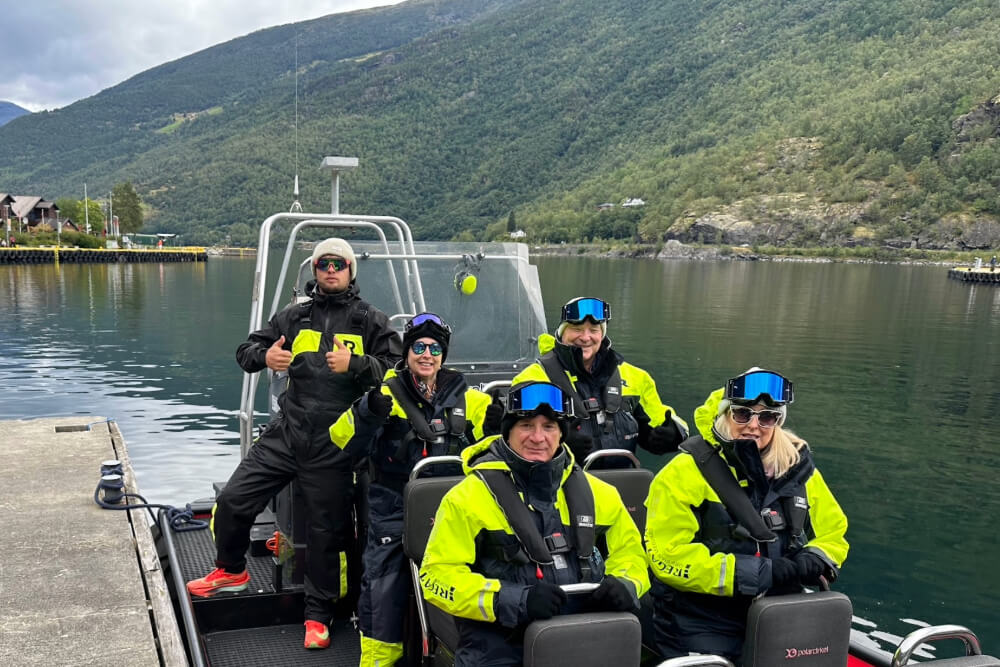 Traveler Suzy Crabb, her husband, and friends on a RIB in Norway.