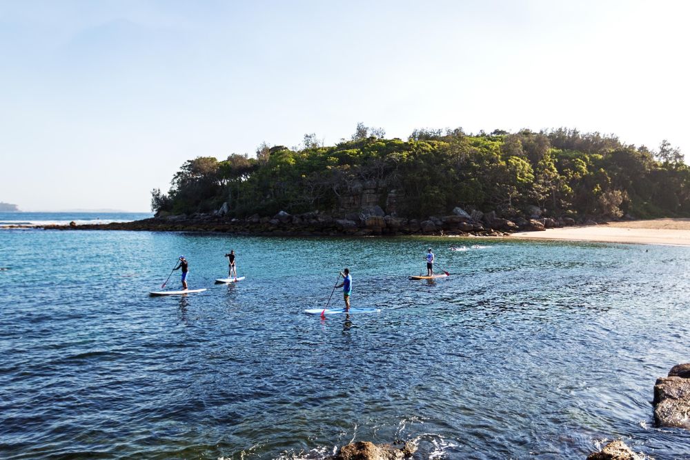 Paddle boarding in Shelly Beach, Manly, Australia.