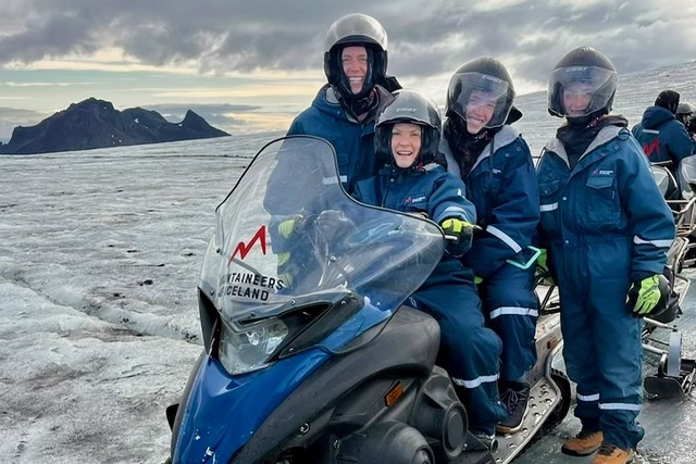 Debra Hyman and family snowmobiling in Iceland.