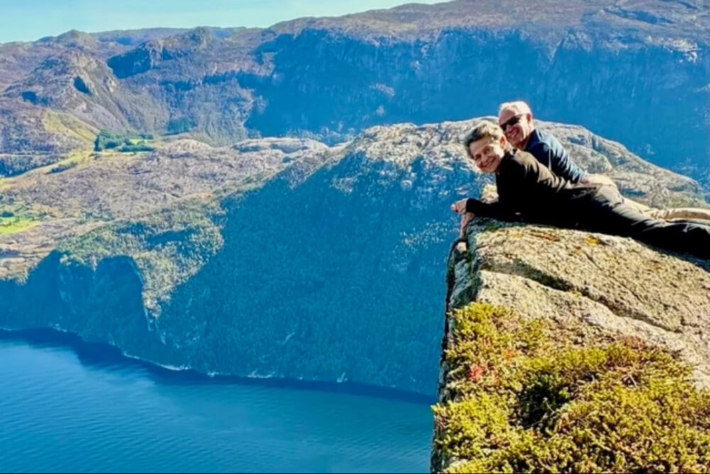 John and Vicky Joseph take in the view from a hike in Stavenger, Norway.
