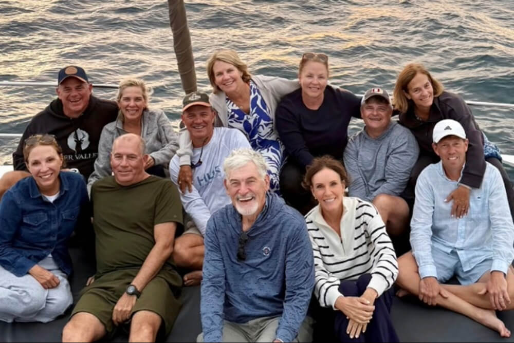 Laine Orcutt and friends on a sunset cruise in Santorini, Greece.