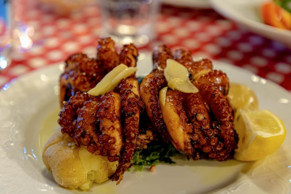 Polvo a lagareiro: traditional Portuguese roasted octopus dish.
