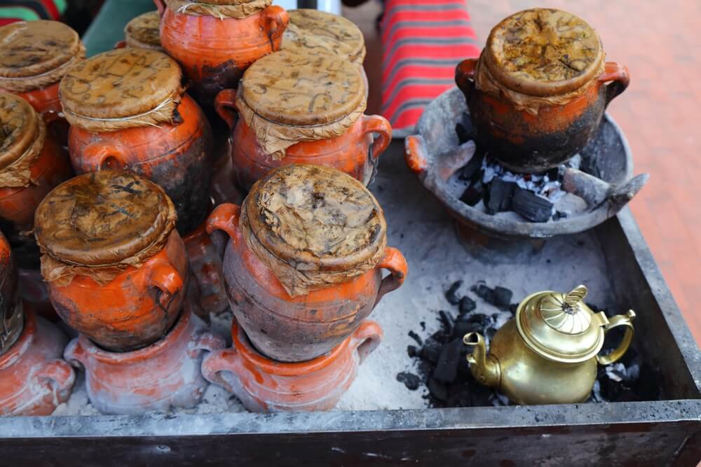 Tangia slow cooked stew pots in Marrakech market of Jemaa El-Fnaa.