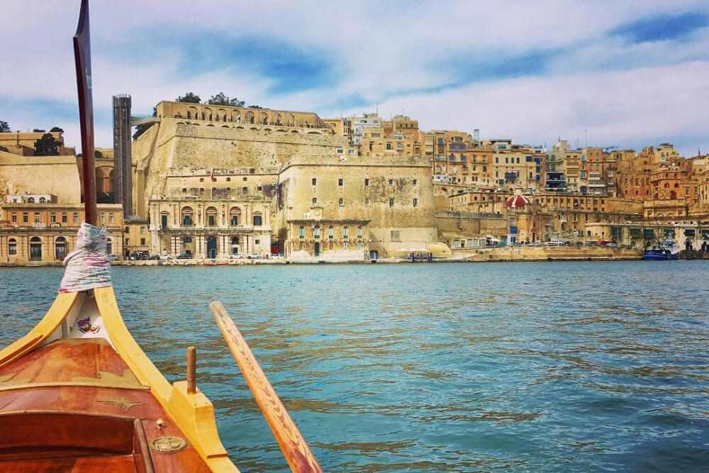 Traditional dghajsa boat on Malta’s Grand Harbour.