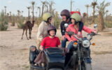 Brook Wilkinson and family riding a sidecar motorcycle in Marrakech, Morocco.