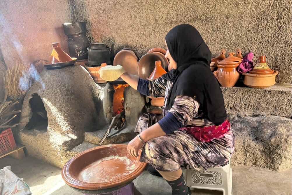 A village resident baking bread in her home in Morocco’s Atlas Mountains.