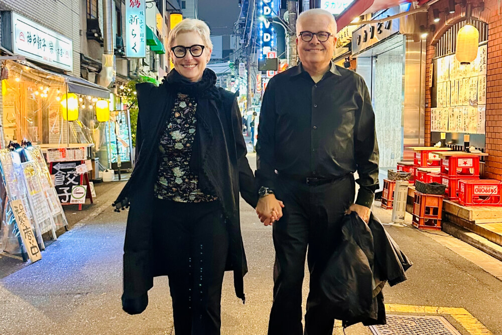 Jessica Tolmach and her husband on the streets of Japan.