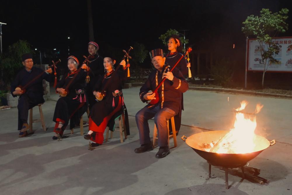 A family performing traditional music in China.