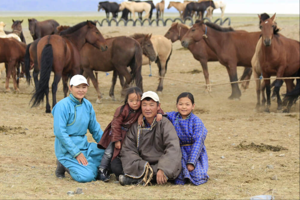 A nomadic family in the Gobi Desert, Mongolia.