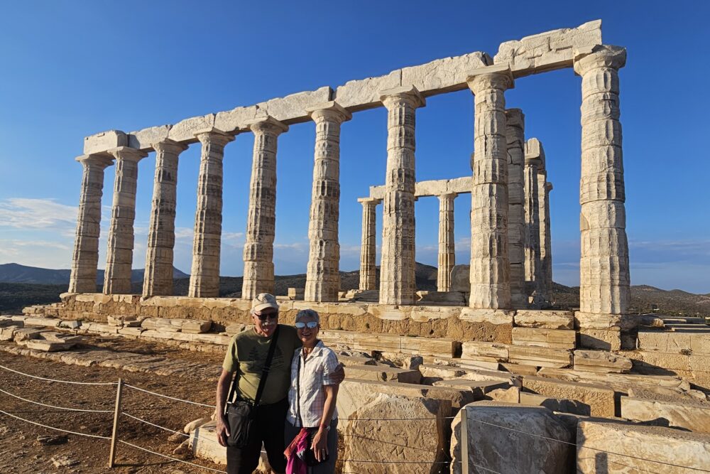Mary Lou Voytko at the Temple of Poseidon in Cape Sounion, Greece.