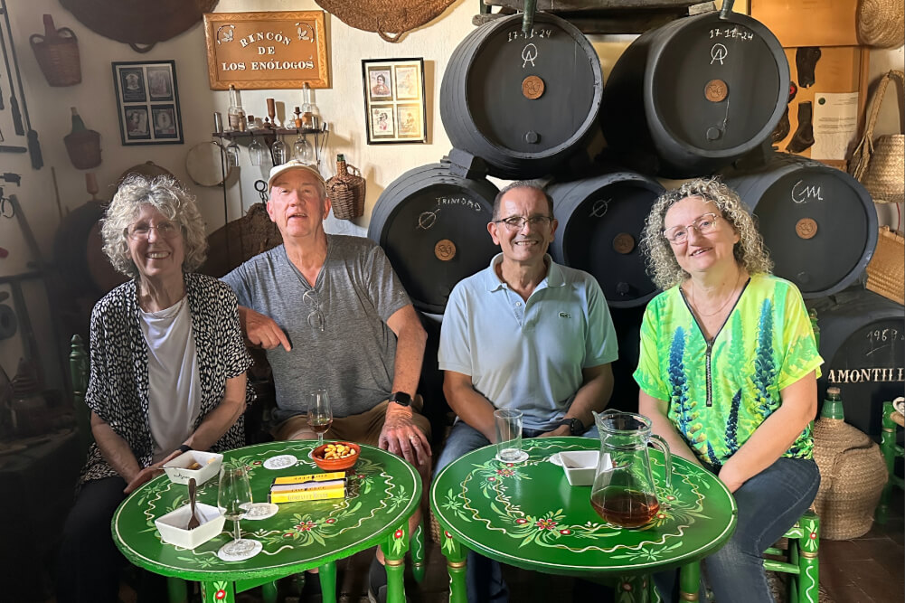 Traveler Tom Redburn enjoying a meal at a home of a sherry-maker outside of Jerez, Spain.