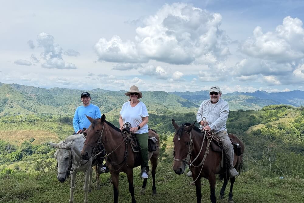 Paula Kramer and family horseback riding in Colombia.