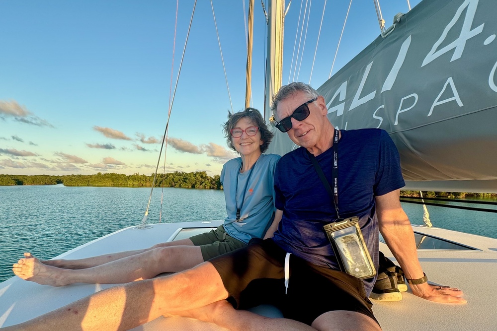 Sharonne Hayes and her companion on a boat in Belize.